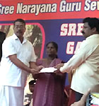 Receiving SNGSS award for the services of Shree Poornathrayeesa Vridhasadanam, Tripunithura